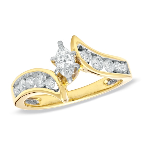 Previously Owned 1 CT. T.w. Marquise Diamond Soldered Bridal Set in 14K Gold with Diamond Accents
