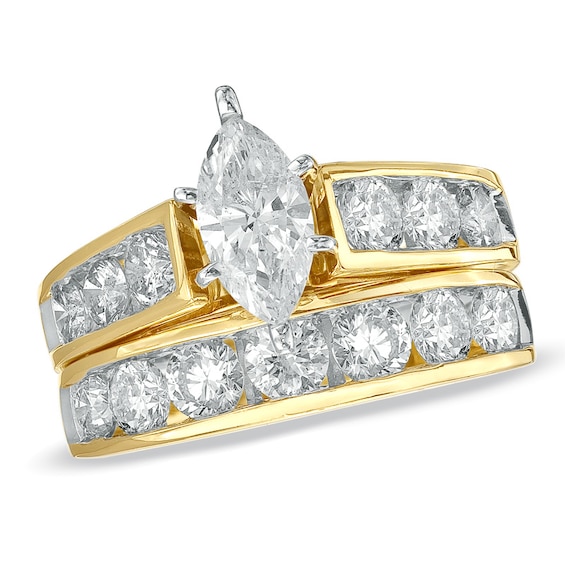 Previously Owned - 3 CT. T.w. Marquise Diamond Bridal Set in 14K Gold with Diamond Accents