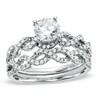 Thumbnail Image 1 of Previously Owned - 1-1/4 CT. T.W. Diamond Twist Bridal Set in 14K White Gold