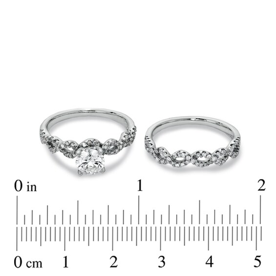 Previously Owned - 1-1/4 CT. T.w. Diamond Twist Bridal Set in 14K White Gold