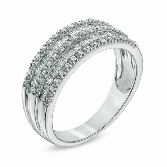 Previously Owned - 1/2 CT. T.w. Baguette and Round Diamond Anniversary Band in 10K White Gold