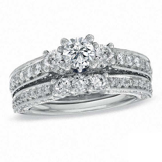 Previously Owned - Vera Wang Love Collection 2 CT. T.w. Diamond Three Stone Bridal Set in 14K White Gold