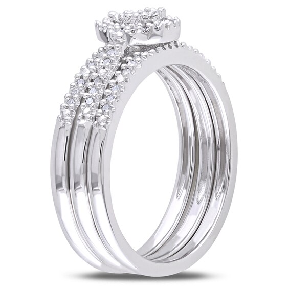 Previously Owned - 1/4 CT. T.w. Diamond Teardrop Cluster Three Piece Bridal Set in Sterling Silver