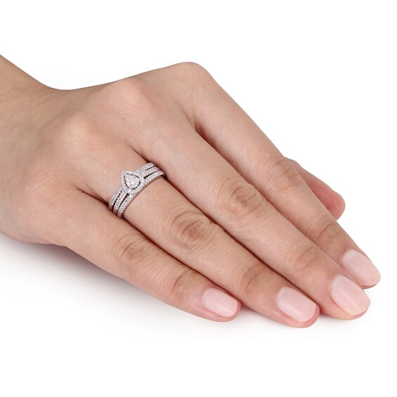 Previously Owned - 1/4 CT. T.w. Diamond Teardrop Cluster Three Piece Bridal Set in Sterling Silver
