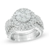Thumbnail Image 1 of Previously Owned - 2-1/2 CT. T.W. Diamond Cluster Twist Three Piece Bridal Set in 14K White Gold