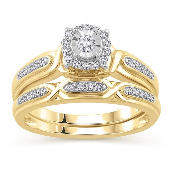 Previously Owned - 1/4 CT. T.w. Diamond Frame Bridal Set in 10K Gold