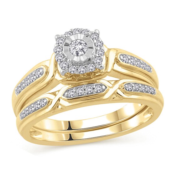 Previously Owned - 1/4 CT. T.w. Diamond Frame Bridal Set in 10K Gold