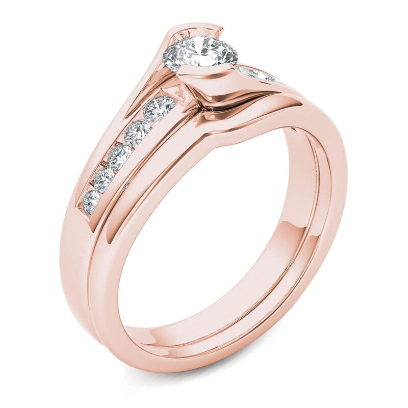 Main Image 2 of Previously Owned - 1/2 CT. T.W. Diamond Bypass Bridal Set in 14K Rose Gold