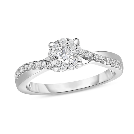 Previously Owned - 1/2 CT. T.w. Diamond Frame Twist Shank Engagement Ring in 10K White Gold