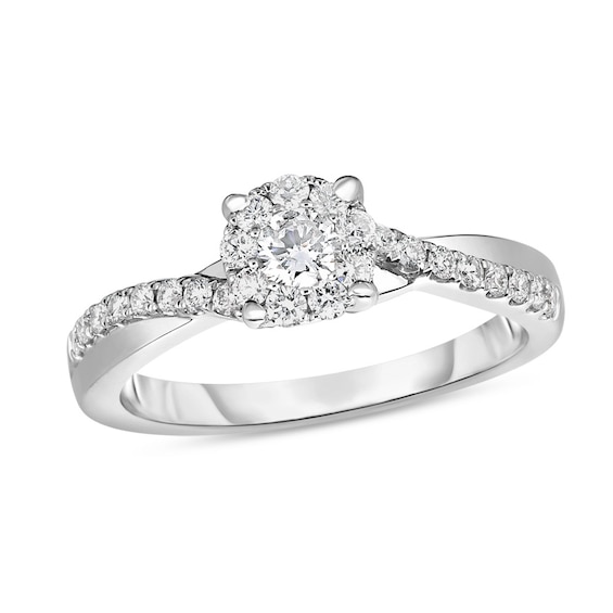 Previously Owned - 1/2 CT. T.w. Diamond Frame Twist Shank Engagement Ring in 10K White Gold
