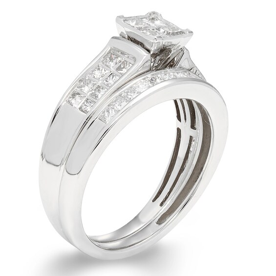 Previously Owned - 1 CT. T.w. Quad Princess-Cut Diamond Frame Bridal Set in 14K White Gold (I/I1)