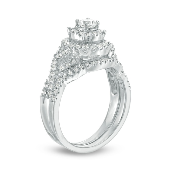 Previously Owned - 3/4 CT. T.w. Diamond Double Frame Twist Bridal Set in 10K White Gold