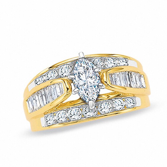 Previously Owned - 1-1/2 CT. T.w. Marquise Diamond Cathedral Bridge Ring in 14K Gold