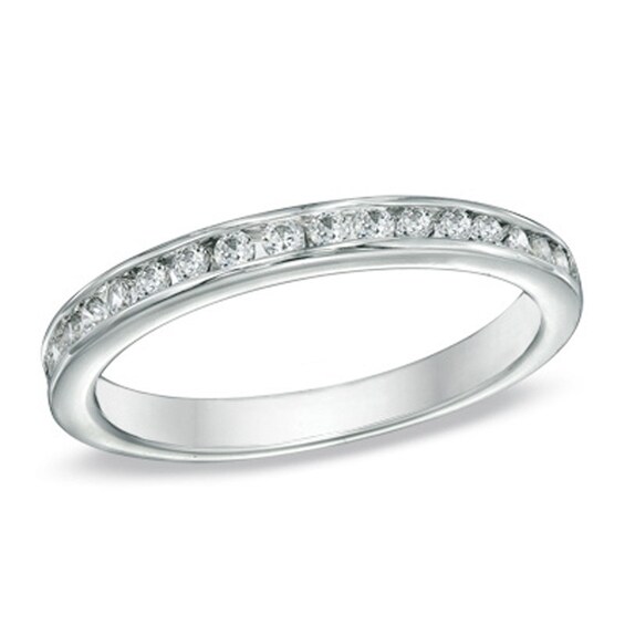 Previously Owned - 1/3 CT. T.w. Diamond Wedding Band in 14K White Gold (I/Si2)