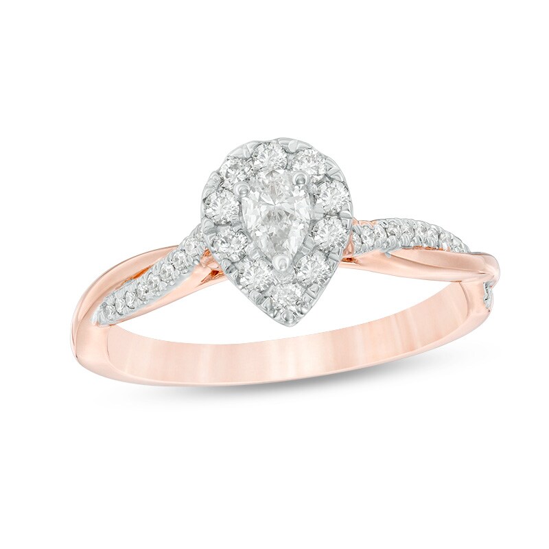 Previously Owned - 3/8 CT. T.W. Pear-Shaped Diamond Frame Twist Engagement in 10K Rose Gold