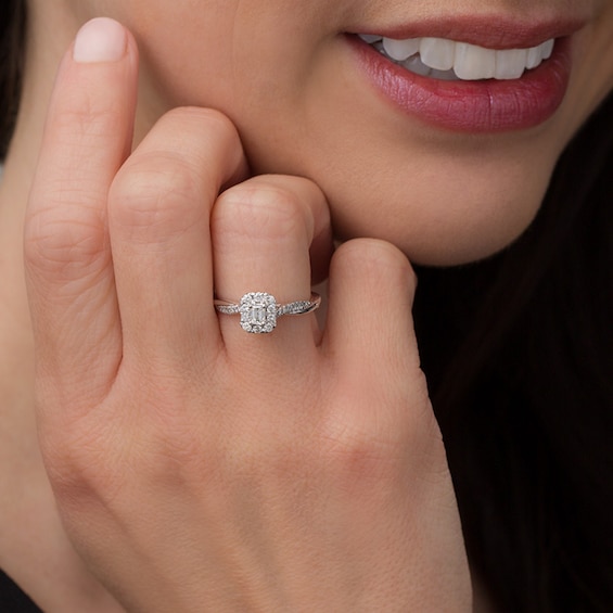 Previously Owned - 3/8 CT. T.w. Emerald-Cut Diamond Frame Twist Engagement Ring in 10K White Gold
