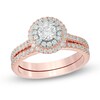 Thumbnail Image 1 of Previously Owned - Celebration Ideal 7/8 CT. T.W. Diamond Double Frame Bridal Set in 14K Rose Gold (I/I1)