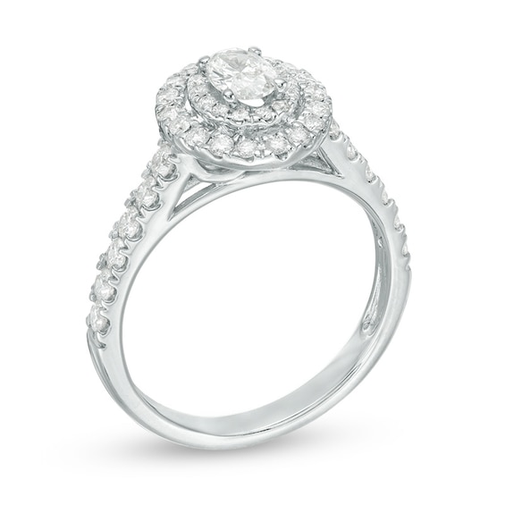 Previously Owned - 1 CT. T.w. Oval Diamond Double Frame Engagement Ring in 14K White Gold