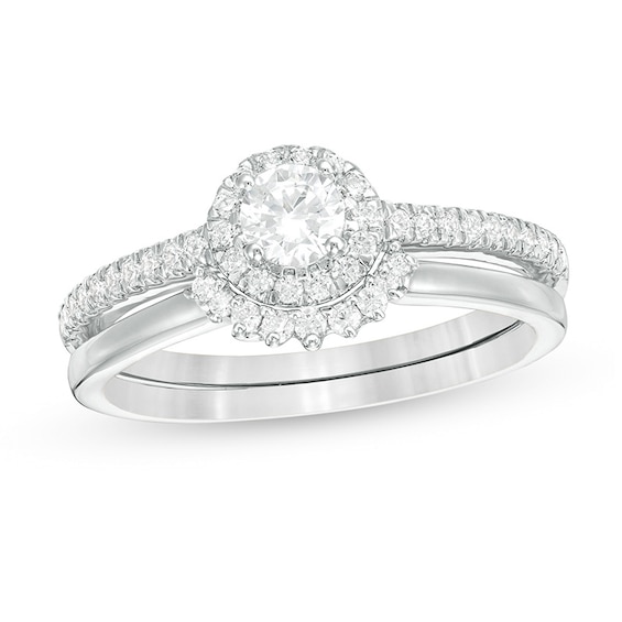 Previously Owned - 1/2 CT. T.w. Diamond Frame Bridal Set in 10K White Gold