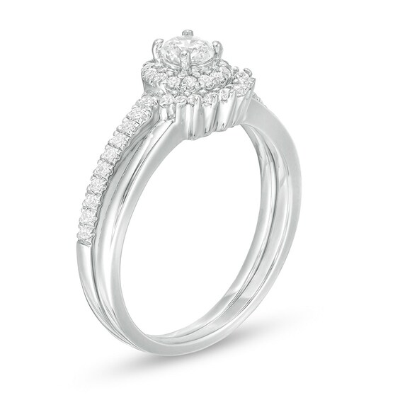 Previously Owned - 1/2 CT. T.w. Diamond Frame Bridal Set in 10K White Gold