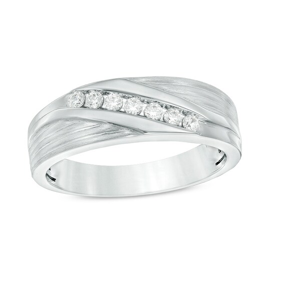 Previously Owned - 1/4 CT. T.w. Diamond Seven Stone Slant Wedding Band in 10K White Gold