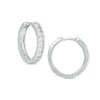 Thumbnail Image 1 of Previously Owned - 1/2 CT. T.W. Diamond Huggie Hoop Earrings in 10K White Gold