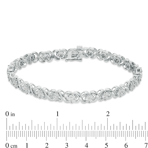Previously Owned - 1/2 CT. T.w. Composite Diamond "Xo" Bracelet in Sterling Silver - 7.25"