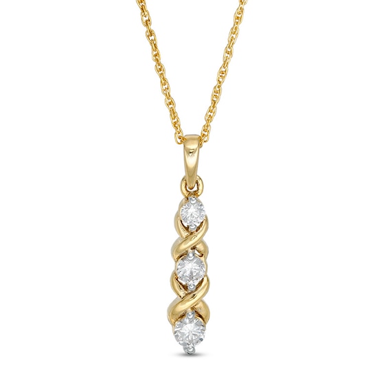 Previously Owned - 1/3 CT. T.w. Diamond Three Stone "Xo" Pendant in 10K Gold