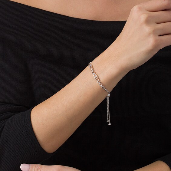 Previously Owned - 1/20 CT. T.w. Diamond "I Heart U" and Infinity Bracelet in Sterling Silver and 10K Rose Gold - 9.5"