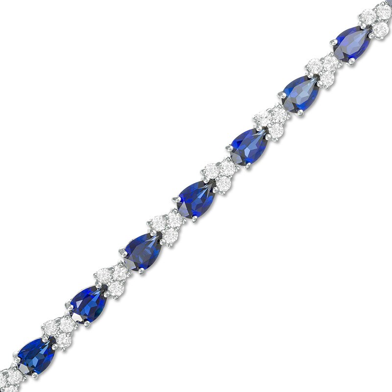 Main Image 1 of Previously Owned - Pear-Shaped Lab-Created Blue and White Sapphire Trios Bracelet in Sterling Silver