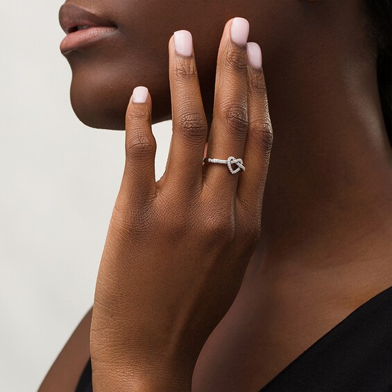 Previously Owned - 1/4 CT. T.w. Diamond Pretzel Love Knot Heart Ring in 10K White Gold