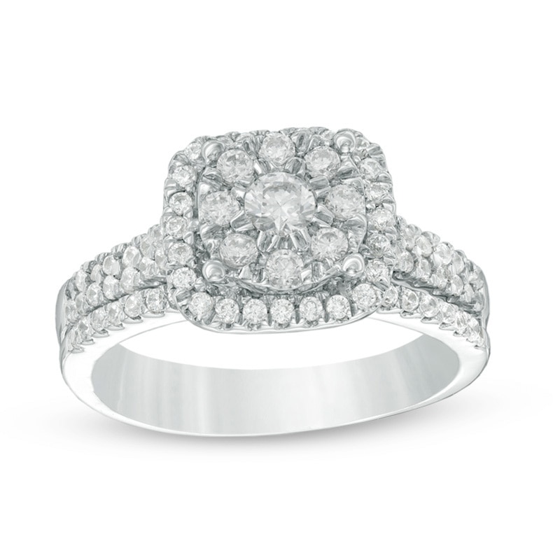 Previously Owned - 5/8 CT. T.W. Diamond Cushion Frame Bridal Set in 10K White Gold
