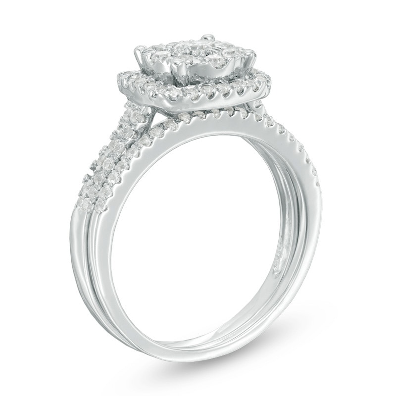 Previously Owned - 5/8 CT. T.W. Diamond Cushion Frame Bridal Set in 10K White Gold