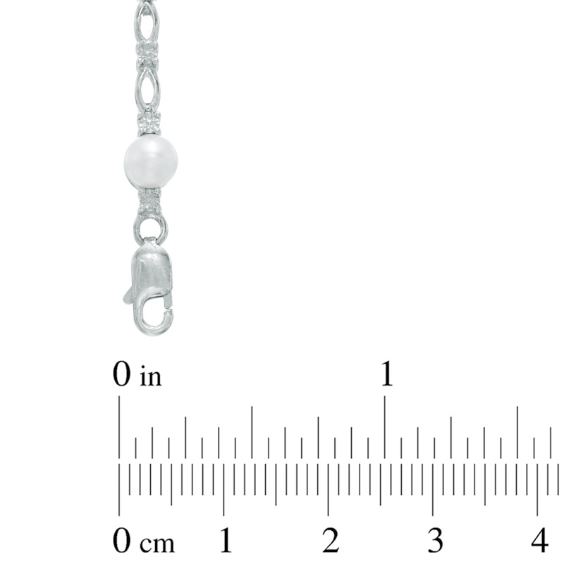 Main Image 2 of Previously Owned-5.0mm Freshwater Cultured Pearl and Diamond Accent Infinity Bracelet in Sterling Silver-7.25"