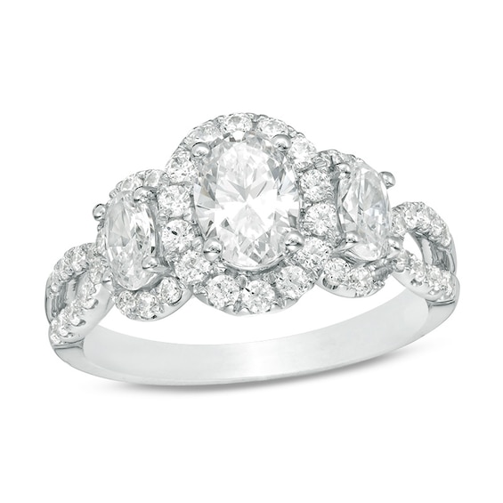 Previously Owned - 2 CT. T.w. Oval Diamond Past Present FutureÂ® Frame Twist Engagement Ring in 14K White Gold