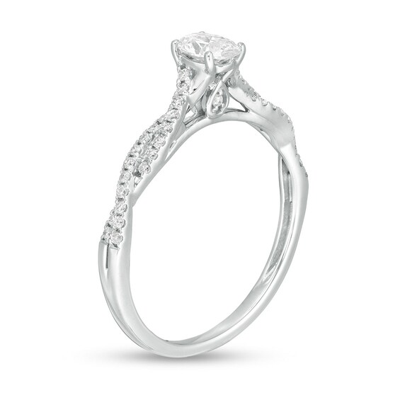 Previously Owned - 1/2 CT. T.w. Oval Diamond Twist Engagement Ring in 14K White Gold