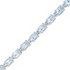 Thumbnail Image 1 of Previously Owned - Sideways Oval Blue Topaz Tennis Bracelet in Sterling Silver - 7.5"