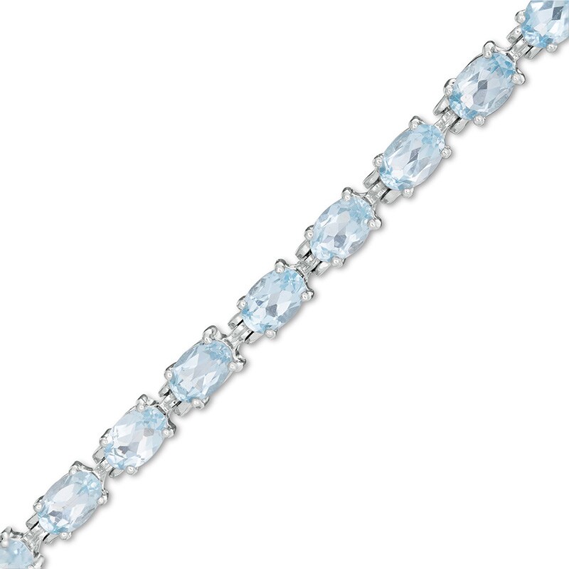 Main Image 1 of Previously Owned - Sideways Oval Blue Topaz Tennis Bracelet in Sterling Silver - 7.5"