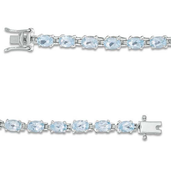 Previously Owned - Sideways Oval Blue Topaz Tennis Bracelet in Sterling Silver - 7.5"