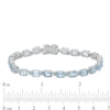 Thumbnail Image 4 of Previously Owned - Sideways Oval Blue Topaz Tennis Bracelet in Sterling Silver - 7.5"
