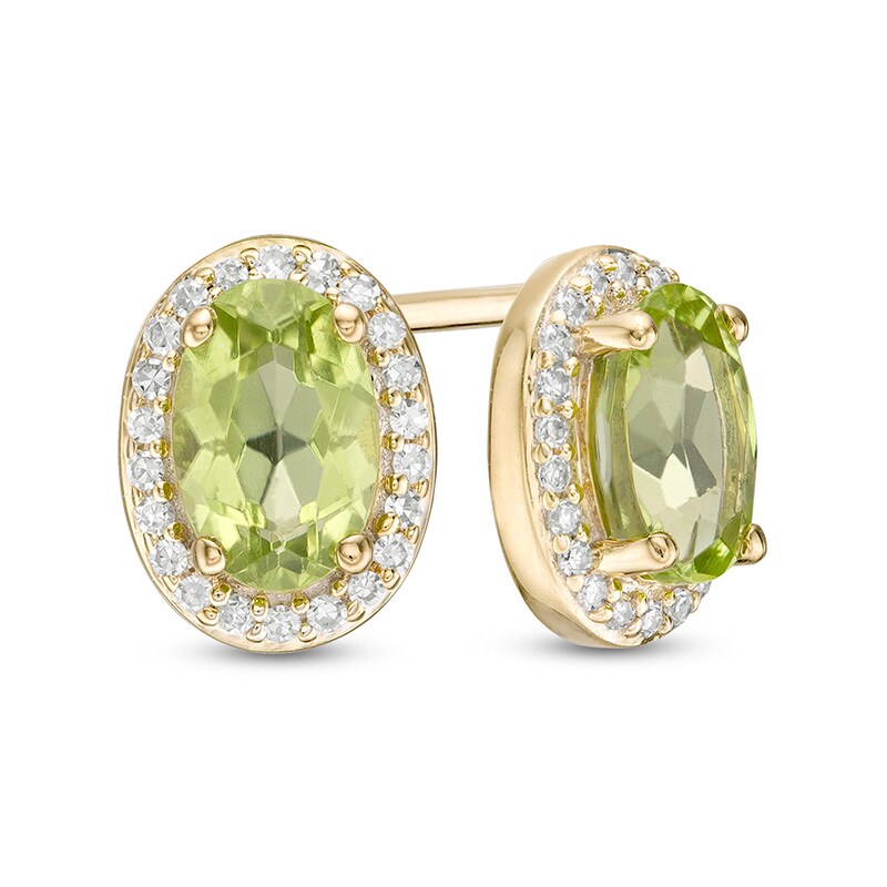 Main Image 1 of Previously Owned - Oval Peridot and 1/10 CT. T.W. Diamond Frame Stud Earrings in 10K Gold