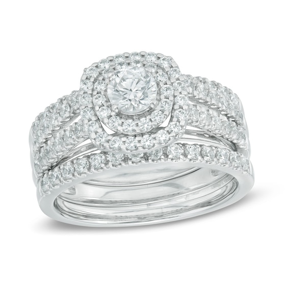 Previously Owned - 1-1/5 CT. T.w. Diamond Frame Three Piece Bridal Set in 14K White Gold