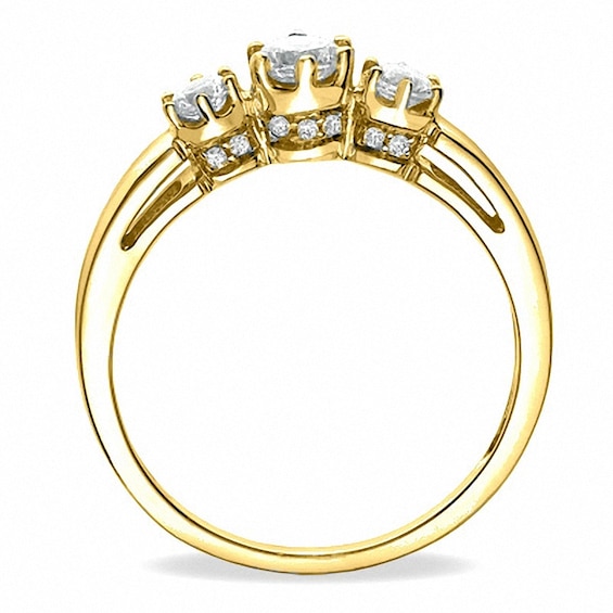 Previously Owned - 1/2 CT. T.w. Diamond Three Stone Ring in 10K Gold