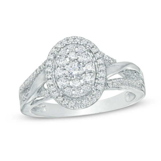 Previously Owned - 1/2 CT. T.w. Oval-Shaped Multi-Diamond Frame Engagement Ring in 10K White Gold