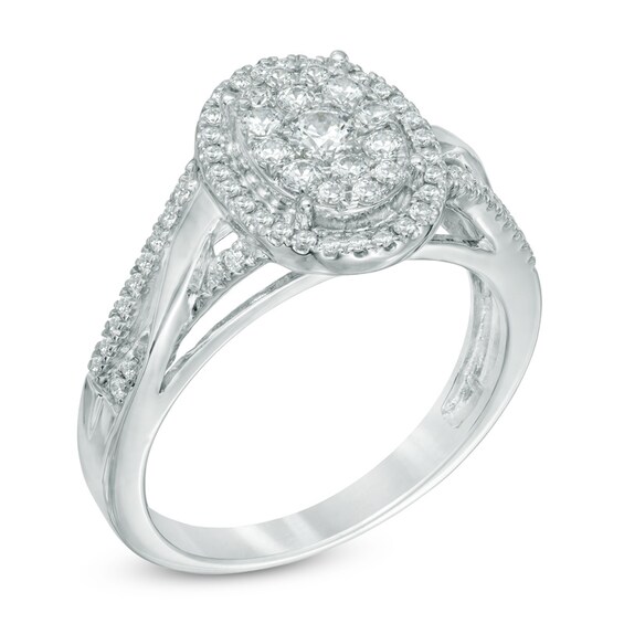 Previously Owned - 1/2 CT. T.w. Oval-Shaped Multi-Diamond Frame Engagement Ring in 10K White Gold