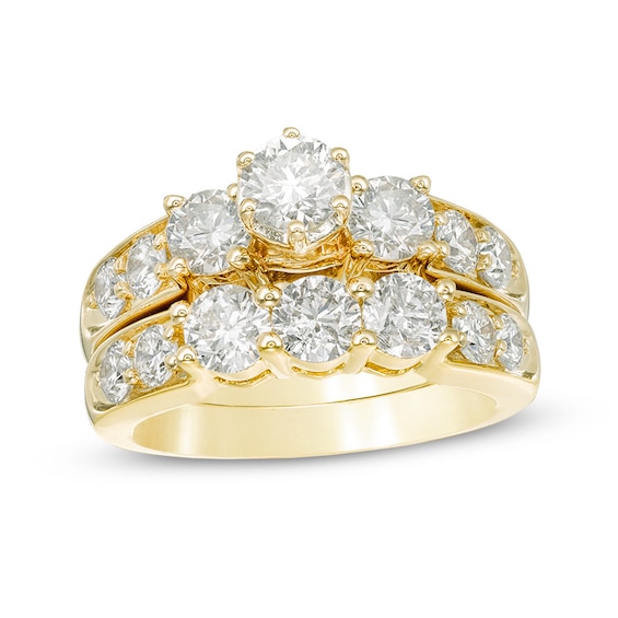 Previously Owned - 3 CT. T.w. Diamond Past Present Future® Bridal Set in 14K Gold