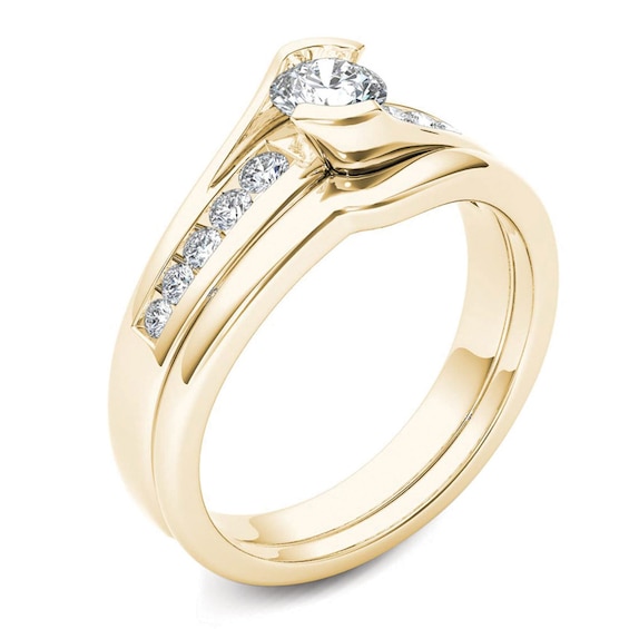 Previously Owned - 1/2 CT. T.w. Diamond Bypass Bridal Set in 14K Gold