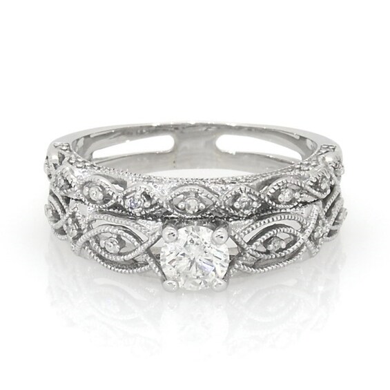 Previously Owned 3/4 CT. T.w. Diamond Vintage-Style Soldered Bridal Set in 10K White Gold