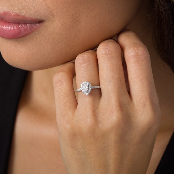 Previously Owned - 1/2 CT. T.w. Pear-Shaped Diamond Frame Engagement Ring in 14K White Gold