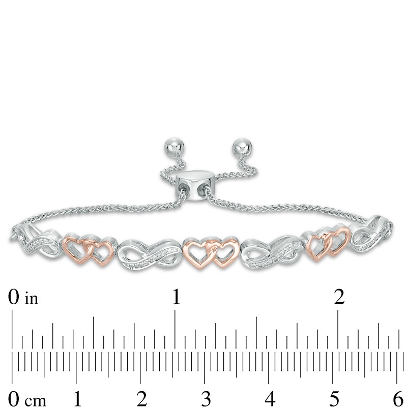 Main Image 2 of Previously Owned - 1/20 CT. T.W. Diamond Heart Infinity Bolo Bracelet in Sterling Silver and 10K Rose Gold - 9.5"